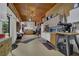 Spacious garage with workbench and storage, offering plenty of room for tools and equipment at 680 Spirit Falls Way, Johns Creek, GA 30022