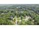A neighborhood view of the houses nestled among mature trees in a vibrant and established community at 742 Maggie Nw Ct, Kennesaw, GA 30144