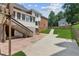 Nice backyard with walkout deck, a lawn and concrete patio at 742 Maggie Nw Ct, Kennesaw, GA 30144