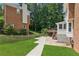 An expansive backyard featuring a well maintained lawn, walkway and fence at 742 Maggie Nw Ct, Kennesaw, GA 30144