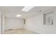 Open basement space featuring recessed lighting, tile floors, and natural light from windows at 742 Maggie Nw Ct, Kennesaw, GA 30144