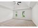 Spacious bedroom featuring vaulted ceilings, new carpet and plenty of natural light at 742 Maggie Nw Ct, Kennesaw, GA 30144