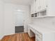 Bright office space featuring custom built-ins and hardwood flooring at 742 Maggie Nw Ct, Kennesaw, GA 30144