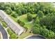 Aerial view of neighborhood green space and townhomes at 1464 Dolcetto Trce at 1464 Dolcetto Trce, Kennesaw, GA 30152