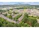 Aerial view of the neighborhood with lush greenery and mountain views at 1464 Dolcetto Trce, Kennesaw, GA 30152