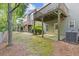 Backyard with wood decks and lush green trees, providing a private outdoor space at 1464 Dolcetto Trce, Kennesaw, GA 30152