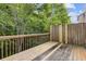 Spacious backyard deck overlooking lush greenery and mature trees at 1464 Dolcetto Trce, Kennesaw, GA 30152