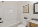 Clean bathroom featuring a shower-tub combo and a modern vanity with stylish decor at 1464 Dolcetto Trce, Kennesaw, GA 30152