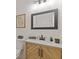 Well-lit bathroom featuring a modern vanity with a herringbone design and gray countertops at 1464 Dolcetto Trce, Kennesaw, GA 30152