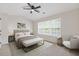 Inviting bedroom with vaulted ceiling, a large window, and neutral décor at 1464 Dolcetto Trce, Kennesaw, GA 30152