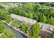 Aerial view of 1464 Dolcetto Trce exterior featuring grey townhome with black car parked in driveway at 1464 Dolcetto Trce, Kennesaw, GA 30152
