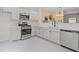Modern kitchen featuring stainless steel appliances and white cabinetry at 1464 Dolcetto Trce, Kennesaw, GA 30152