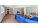 Spacious finished basement featuring wood floors, seating area, and natural light at 3120 Mary Dr, Marietta, GA 30066