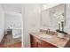 Bathroom featuring vanity with granite countertop and view of the bedroom at 3120 Mary Dr, Marietta, GA 30066