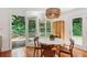 Cozy dining room with access to backyard patio and classic wood floors at 3120 Mary Dr, Marietta, GA 30066