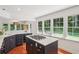 Bright kitchen featuring quartz countertops, center island, and stainless steel appliances at 3120 Mary Dr, Marietta, GA 30066