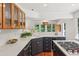 Light and airy kitchen boasts a stylish island, quartz countertops, and lots of storage at 3120 Mary Dr, Marietta, GA 30066