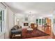 Inviting living room with a cozy fireplace and wood floors at 3120 Mary Dr, Marietta, GA 30066