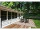 Back patio featuring a brick patio, outdoor furniture, and a well-manicured lawn at 3120 Mary Dr, Marietta, GA 30066