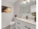 Stylish bathroom features a sleek vanity with modern fixtures and elegant mirror at 3288 Tarragon Dr, Decatur, GA 30034