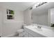 Charming bathroom features a vanity, and an adjacent shower and tub at 3288 Tarragon Dr, Decatur, GA 30034