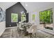 Elegant dining room offers ample natural light and a serene view of the outdoors at 3288 Tarragon Dr, Decatur, GA 30034