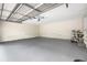 Spacious two car garage with storage, door opener, and high ceilings at 3288 Tarragon Dr, Decatur, GA 30034