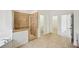 Bathroom featuring a glass-enclosed shower, and a soaking tub at 5066 Healey Dr, Smyrna, GA 30082