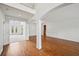 Open-concept living room with hardwood floors, recessed lighting, and expansive staircase at 5066 Healey Dr, Smyrna, GA 30082