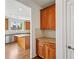 The kitchen features wooden cabinets, granite countertops, a pantry, and stainless steel appliances at 5066 Healey Dr, Smyrna, GA 30082