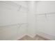 Walk-in closet featuring wire shelving and neutral carpet at 5066 Healey Dr, Smyrna, GA 30082
