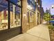 Attractive brick building featuring large windows and wooden doors, creating an inviting commercial space at 6640 Avis Walk, Alpharetta, GA 30005