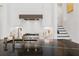 Contemporary kitchen featuring a sleek cooktop, stylish backsplash, and plenty of counter space for cooking at 6640 Avis Walk, Alpharetta, GA 30005
