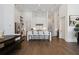 Bright, open kitchen featuring a large island with seating, stainless steel appliances, and hardwood floors at 6640 Avis Walk, Alpharetta, GA 30005