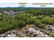 Scenic aerial view of the neighborhood, with proximity to Sawnee Mountain Park and Cumming at 7435 Ansley Park Way, Cumming, GA 30028