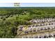 Aerial view of neighborhood near Publix, showcasing the community layout at 7435 Ansley Park Way, Cumming, GA 30028