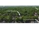 Scenic aerial view of a beautiful neighborhood with mature trees, highlighting the property's location at 156 Martha Ne Ave, Atlanta, GA 30317