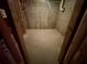Unfinished basement area with concrete flooring and foundation ready for new construction or development at 1652 Park Hollow Ln, Lawrenceville, GA 30043