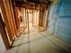 Unfinished basement with concrete floor and unfinished wooden framing. A blank slate with lots of potential at 1652 Park Hollow Ln, Lawrenceville, GA 30043