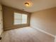 Neutral bedroom with carpet and natural light at 1652 Park Hollow Ln, Lawrenceville, GA 30043