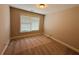 Cozy bedroom with carpet and natural light at 1652 Park Hollow Ln, Lawrenceville, GA 30043