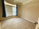 Cozy bedroom with neutral carpet, a large window, and ample natural light at 1652 Park Hollow Ln, Lawrenceville, GA 30043