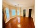 Dining room with hardwood flooring and a view of the backyard at 1652 Park Hollow Ln, Lawrenceville, GA 30043