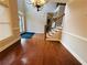 Inviting foyer with hardwood floors, staircase, and a front door with glass accents at 1652 Park Hollow Ln, Lawrenceville, GA 30043
