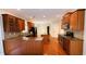 Spacious kitchen with stainless steel appliances, granite countertops, and hardwood floors at 1652 Park Hollow Ln, Lawrenceville, GA 30043