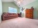 Bedroom with vaulted ceiling, neutral carpet and large window at 3836 Vineyards Lake Nw Cir # U17, Kennesaw, GA 30144