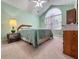 Bedroom with high ceilings, large window and neutral carpet at 3836 Vineyards Lake Nw Cir # U17, Kennesaw, GA 30144