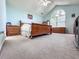 This spacious bedroom features large window, carpet floors, and vaulted ceiling at 3836 Vineyards Lake Nw Cir # U17, Kennesaw, GA 30144
