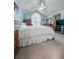 Bright bedroom featuring high ceilings, a large window, and comfortable carpeting at 3836 Vineyards Lake Nw Cir # U17, Kennesaw, GA 30144