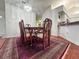 Dining room featuring a vintage table, seating for six, and hardwood flooring at 3836 Vineyards Lake Nw Cir # U17, Kennesaw, GA 30144